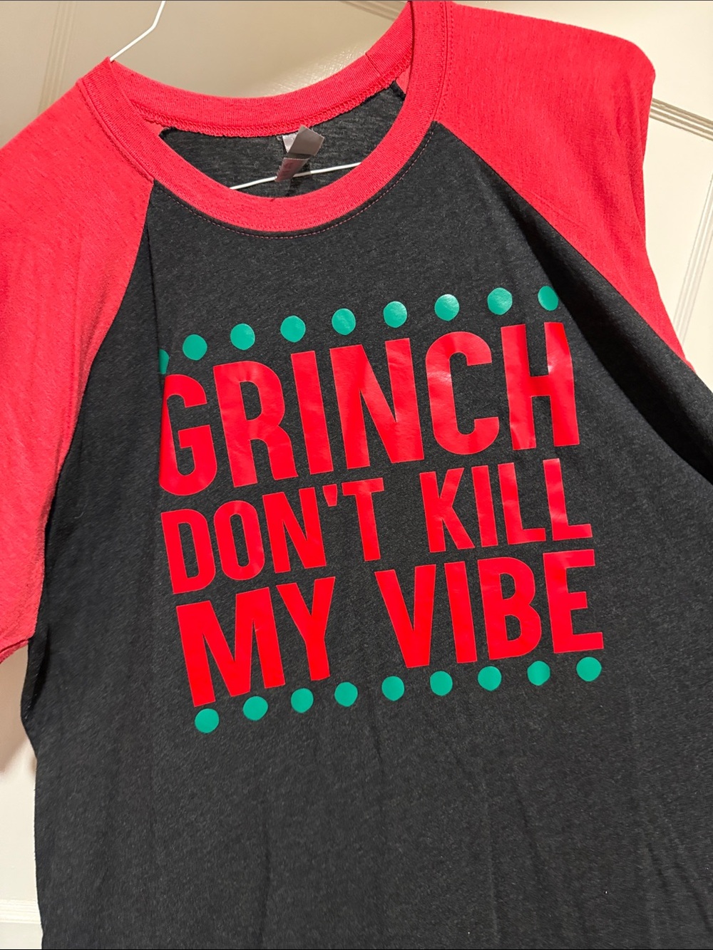 Next Level Apparel Red-Sleeve Black Raglan Tee with Green Dot Graphic